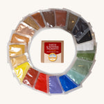 Natural Earth Paint sample pack containing 20 different colours in individual packets with the cardboard box in the middle 