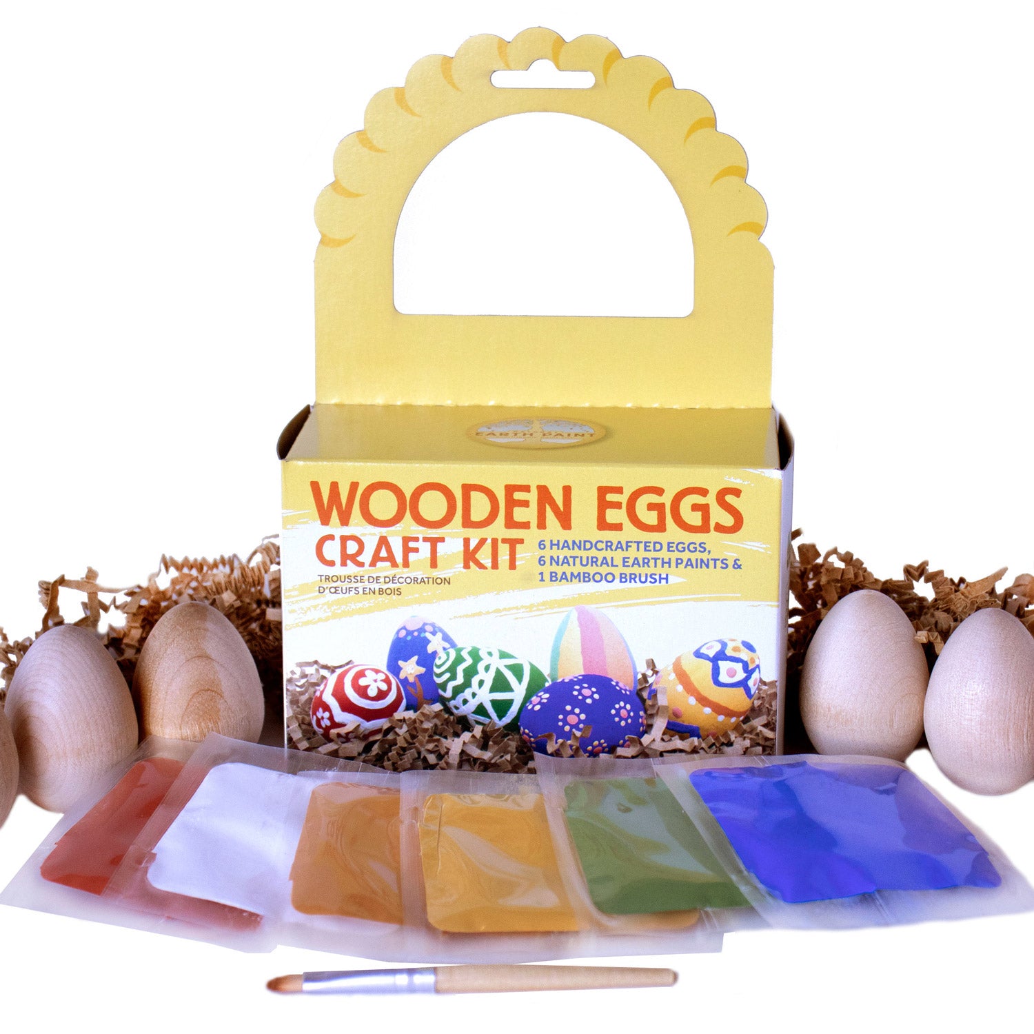 Natural Earth Paint Wooden Eggs Craft Kit with kit contents of wooden eggs and paint mixes pictured in front of the box