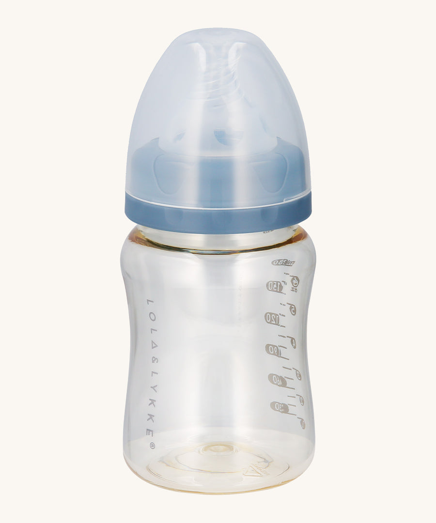 Lola & Lykke Natural Flow Baby Bottle with cap. The soft silicone nipple teat features an anti-colic valve and mimics the feel of the breast, nurturing a natural latch