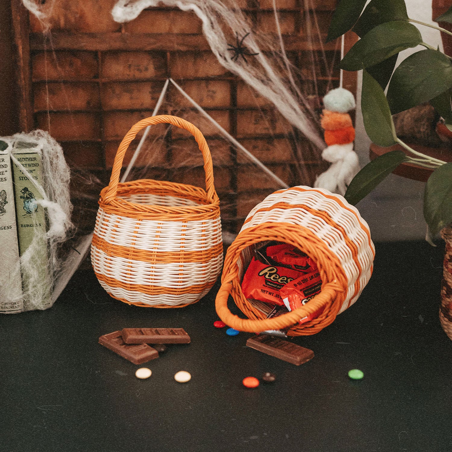 light cream colour with orange stripes and orange handle