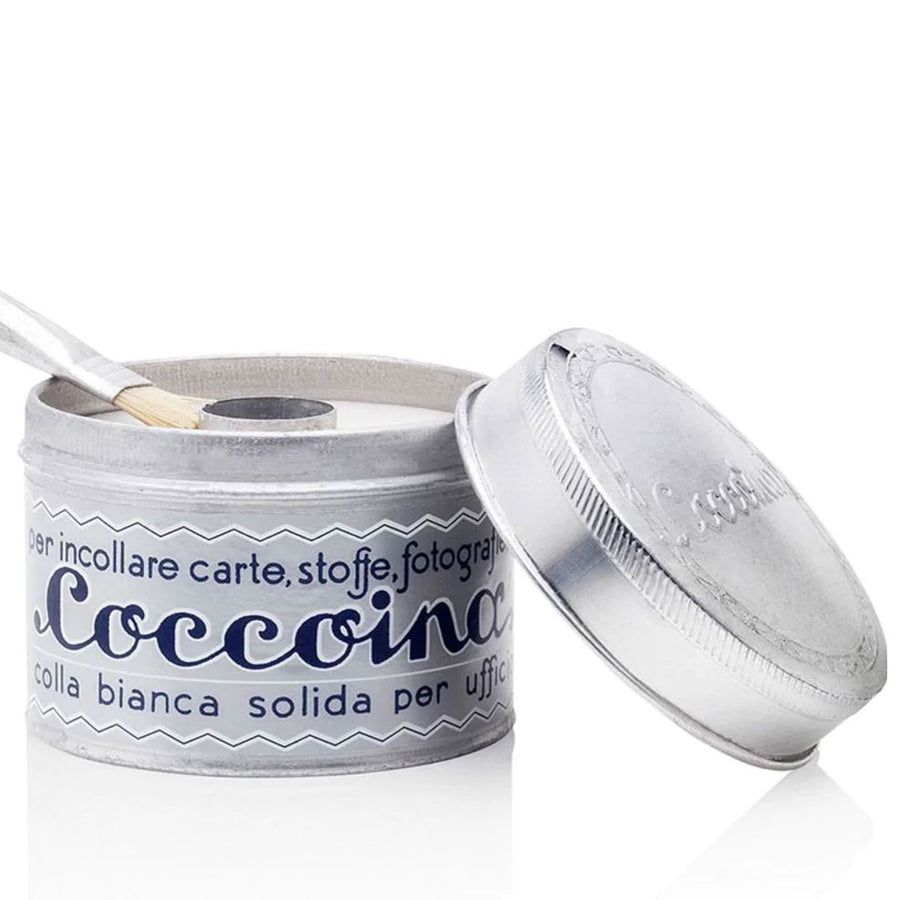 Coccoina Natural Plastic Free Glue in a metal pot with brush pictured on a plain white background 