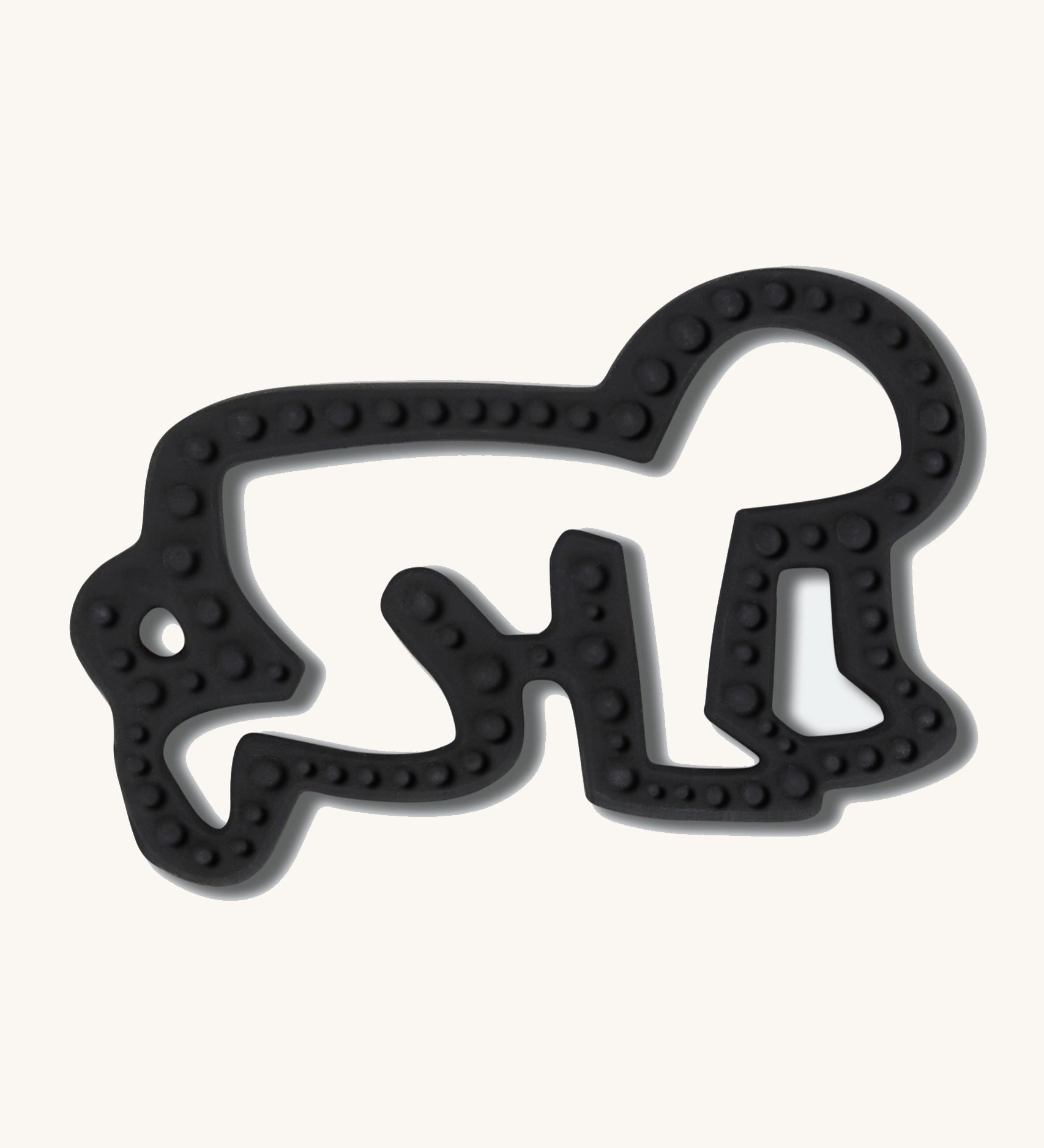 Etta Loves X Keith Haring Natural Rubber Sensory Teether - Baby showing the texture on the teether