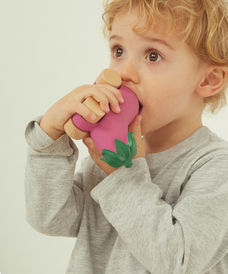 A child playing with the Oli Carol Rubber Cars