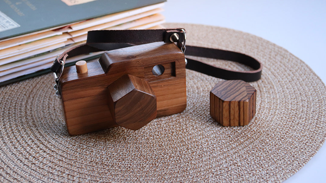 O_wow wooden toy camera with a leather camera strap