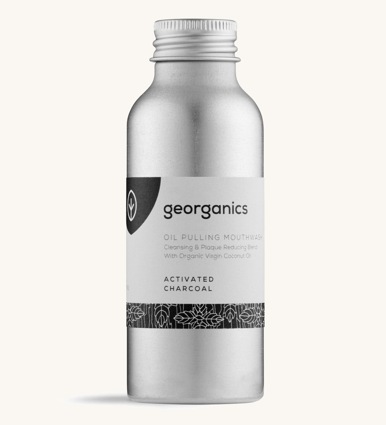 A bottle of the Georganics activated charcoal oil pulling mouthwash on a cream background.