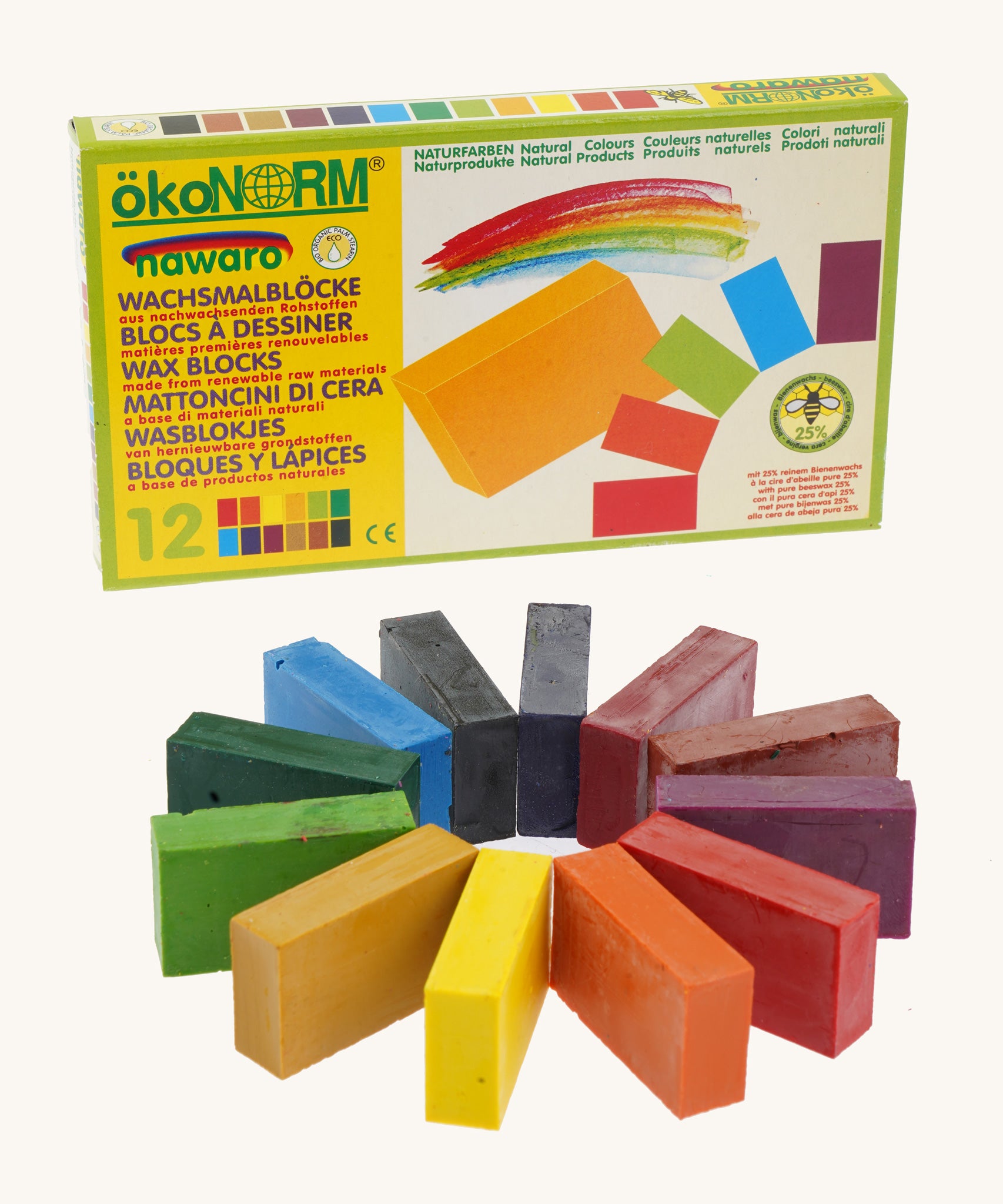 OkoNorm 12 Coloured Wax Crayon Blocks. Pictured next to their cardboard packaging box.