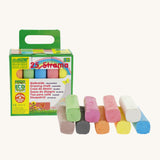 Okonorm multicoloured drawing chalks stacked next to the green and yellow cardboard packaging 