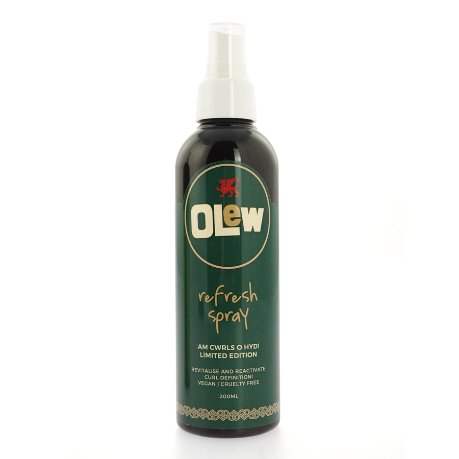 Olew limited edition hair refresh spray bottle on a white background