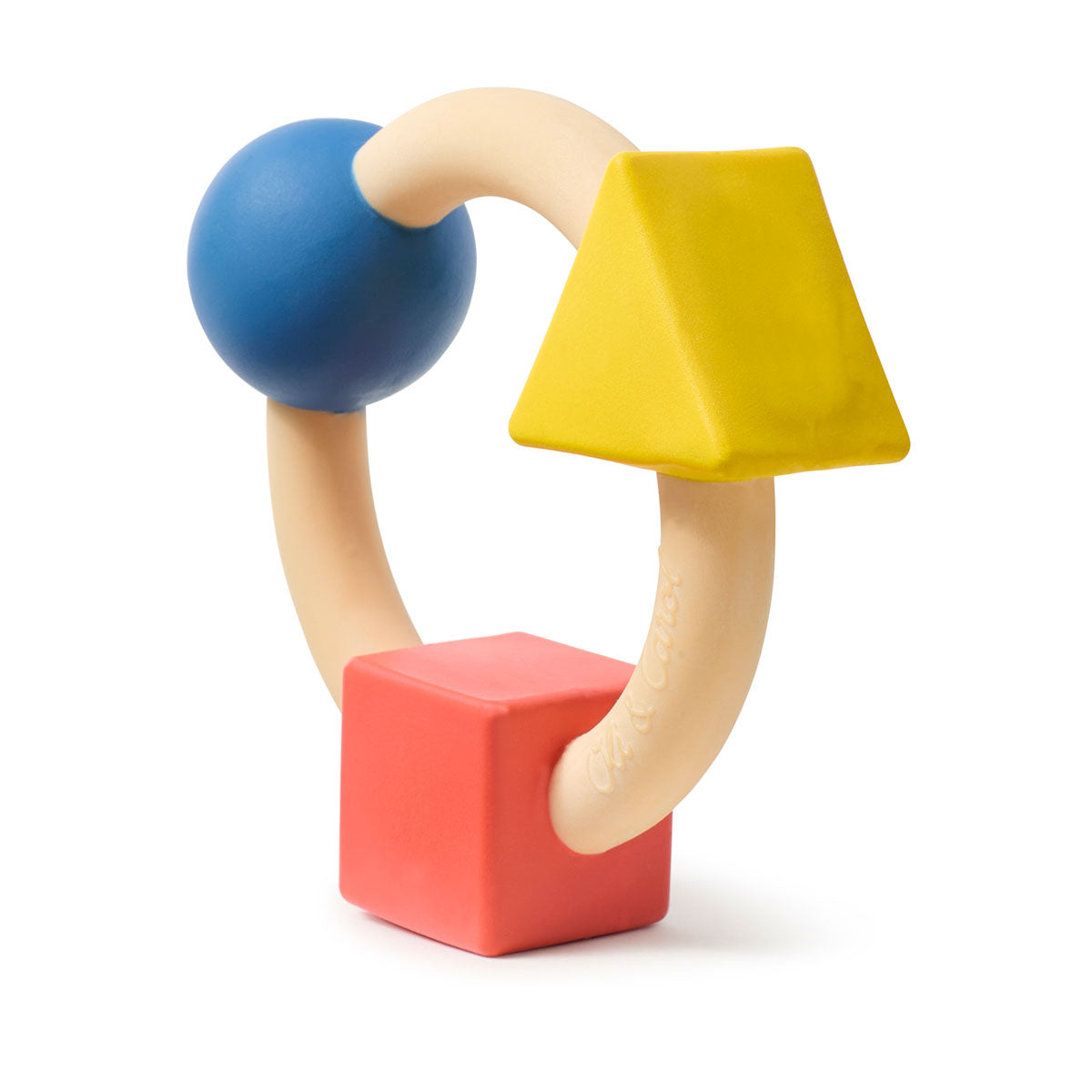 Oli & Carol X Bauhaus Movement Teething Ring placed on a cotton safety strap pictured on a plain white background