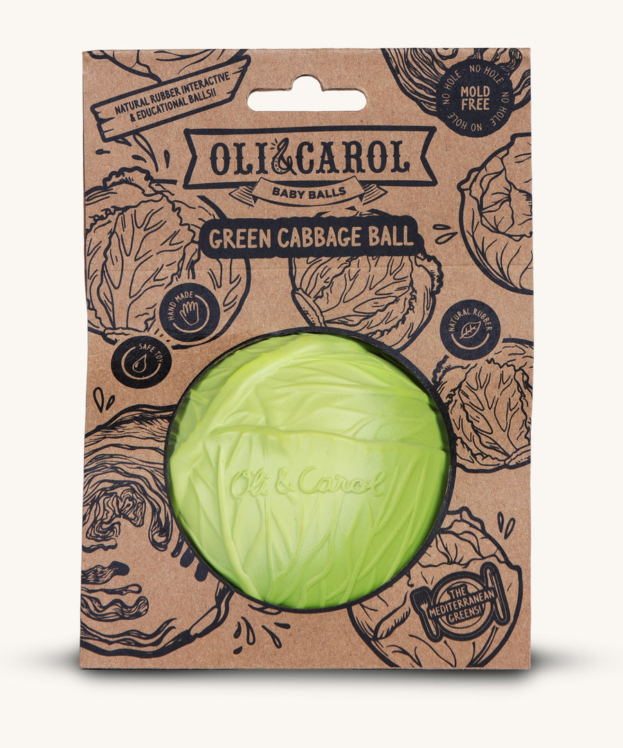 The Oli & Carol Natural Rubber Baby Ball - Green Cabbage in it's card packaging sleeve on a plain background.