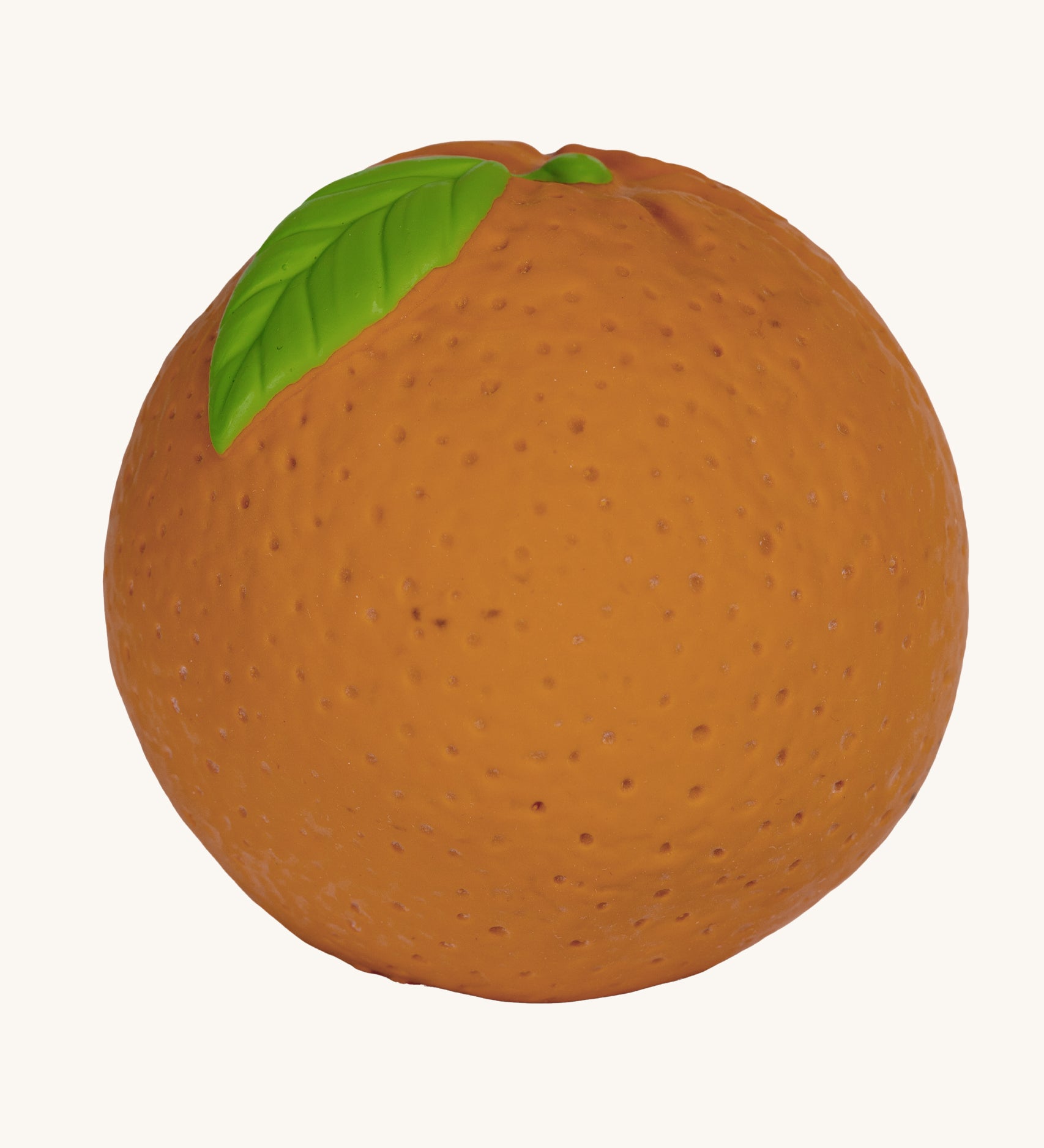 Oli & Carol Natural Rubber Baby Ball - Orange on a plain background.