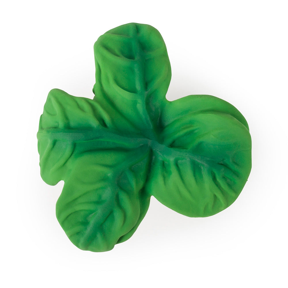 Close up of the leaves on the eco-friendly rubber radish toy from oli and carol on a white background