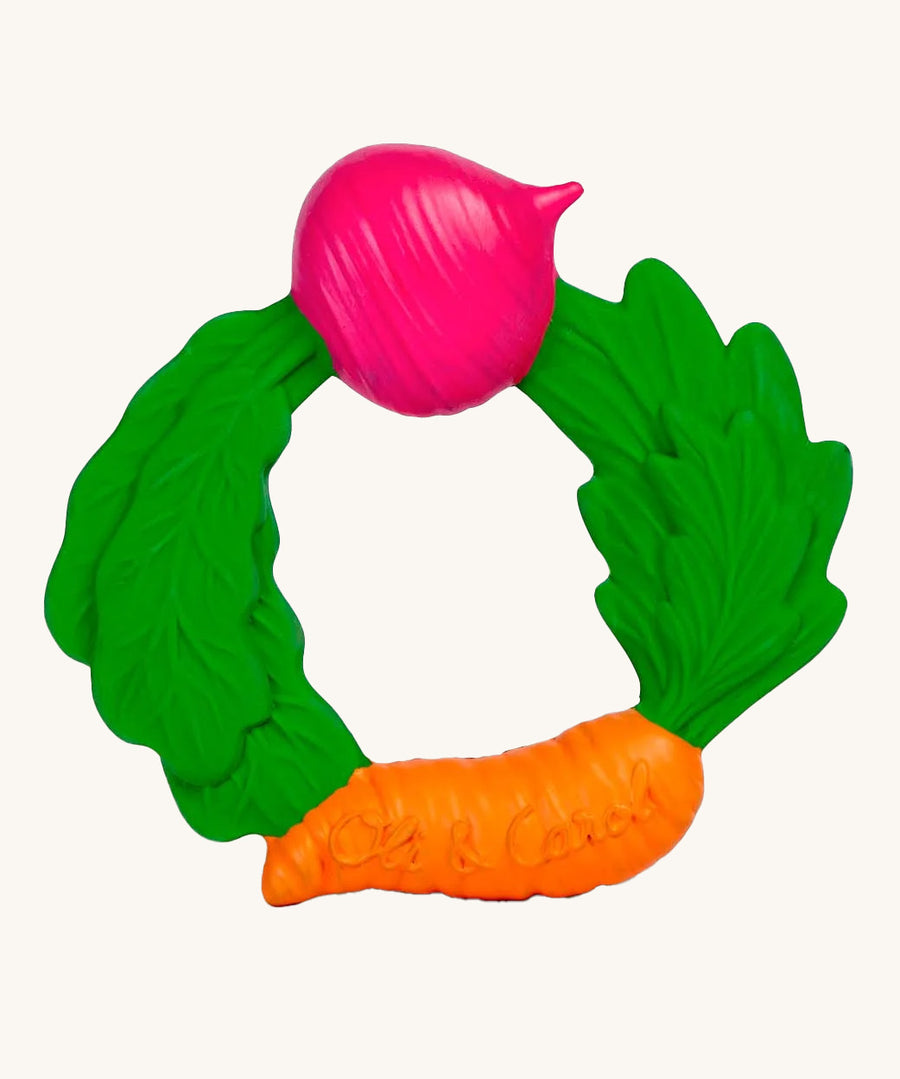 The Oli & Carol Natural Rubber Veggie Teething Ring on a plain background. 