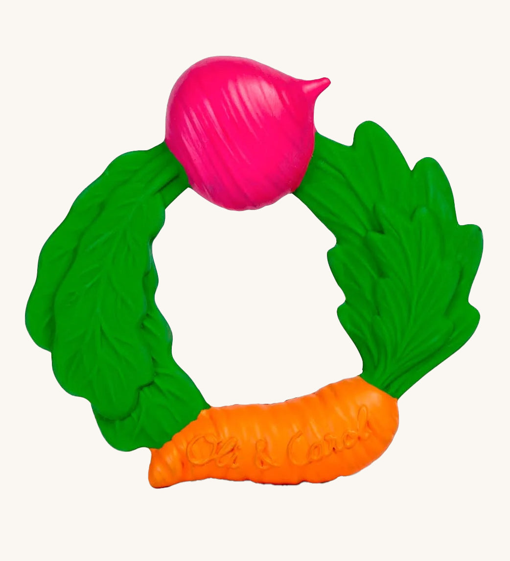 The Oli & Carol Natural Rubber Veggie Teething Ring on a plain background. 