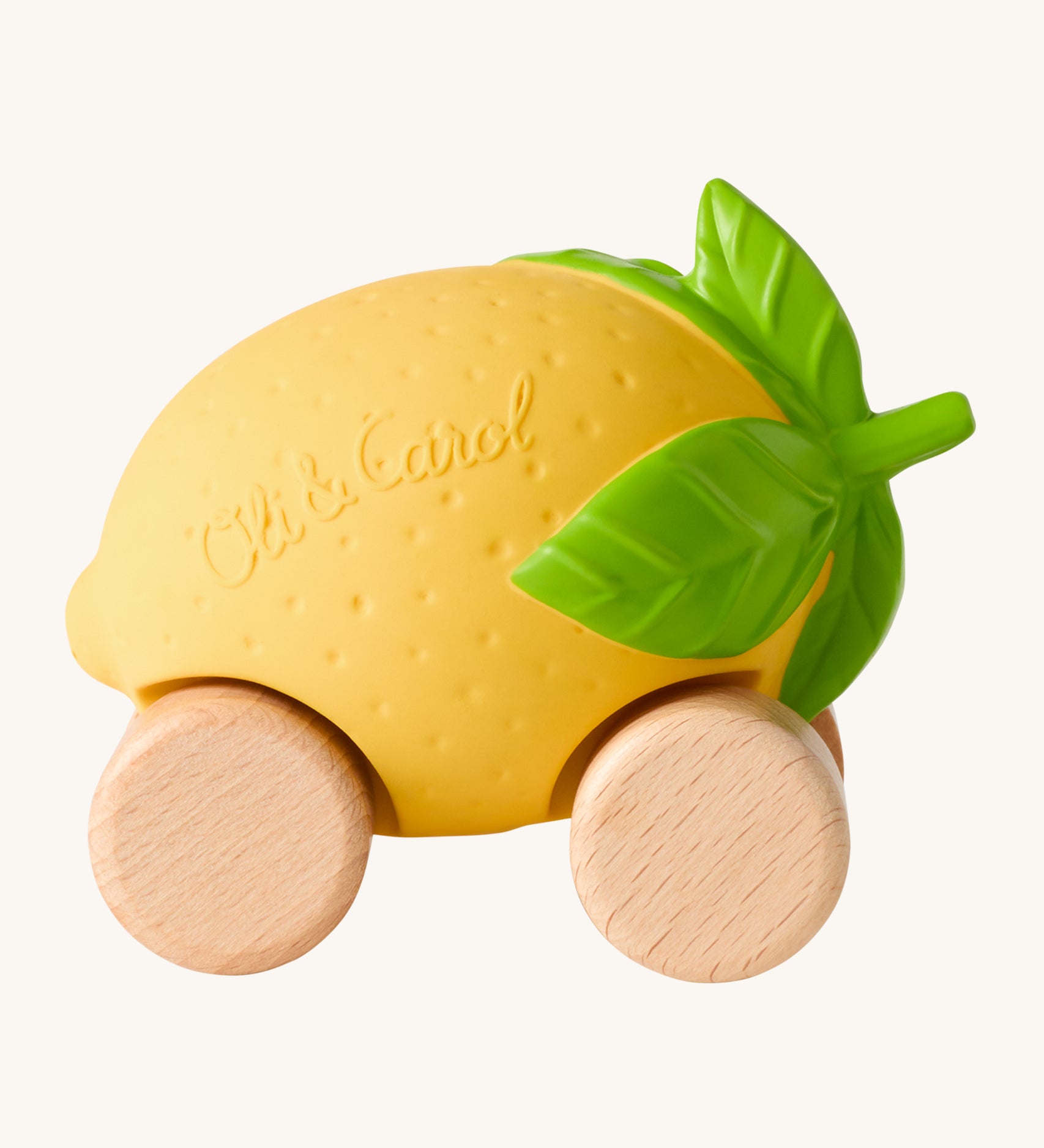 Oli & Carol Lou The Lemon Baby Car. A fun yellow lemon car with a green leafy top, and wooden wheels on a cream background