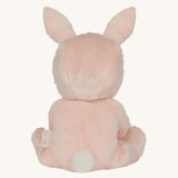 Olli Ella pink coloured Babbit Bunny Dinky Dinkum Doll in a seated position facing away from the camera showing the back of the dolly