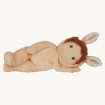 Olli Ella light sand coloured Bubba Bunny Dinky Dinkum Doll in a side laying position. 