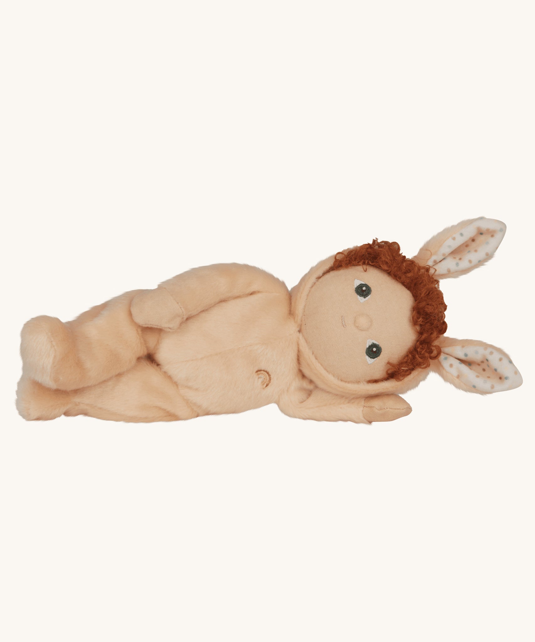 Olli Ella light sand coloured Bubba Bunny Dinky Dinkum Doll in a side laying position. 