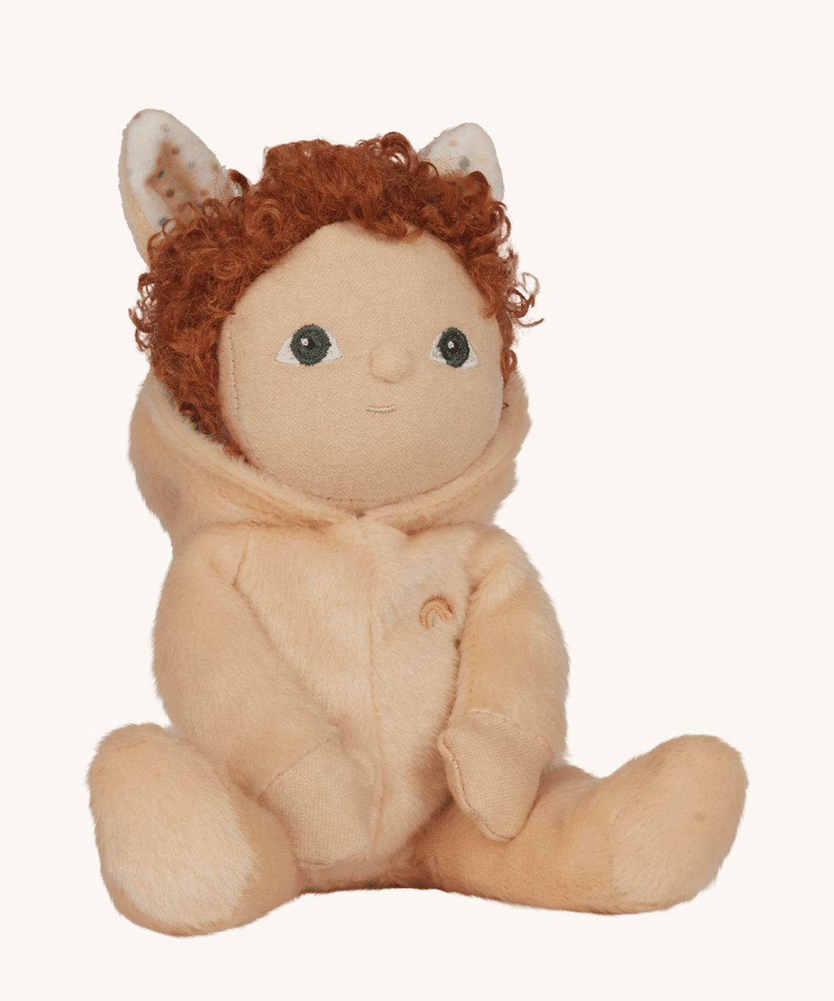 Olli Ella light sand coloured Bubba Bunny Dinky Dinkum Doll in a seated position. The bunny ear hood has been pulled back showing the curly red coloured hair. 