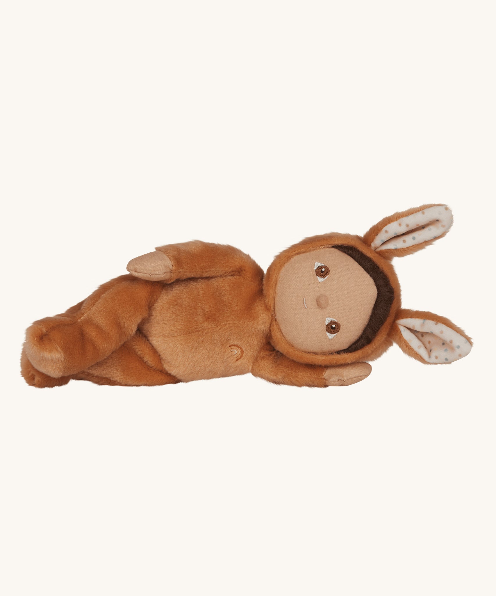 Olli Ella toffee coloured Bucky Bunny Dinky Dinkum Doll in a side laying position.