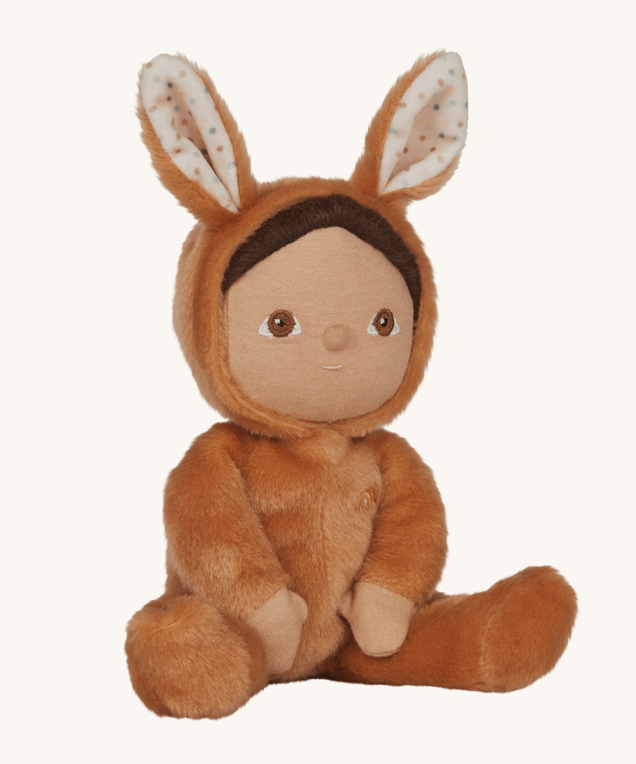 Olli Ella toffee coloured Bucky Bunny Dinky Dinkum Doll in a seated position.