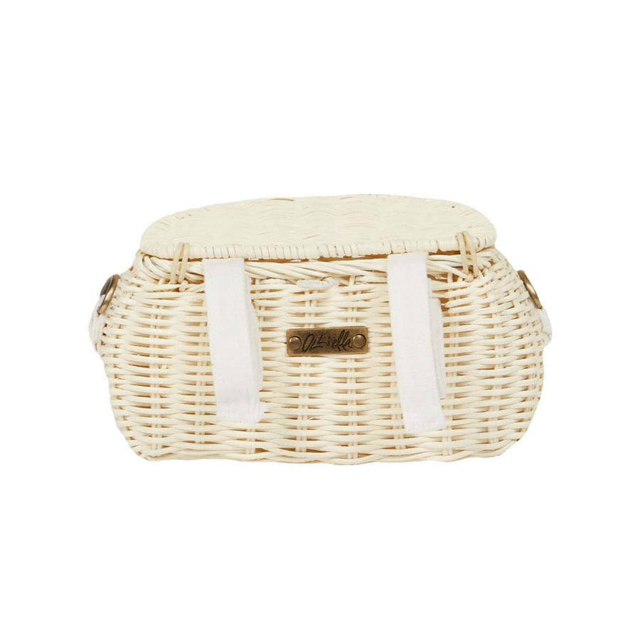 Back of the Olli ella natural rattan mini chari bag in the chalk colour on a white background