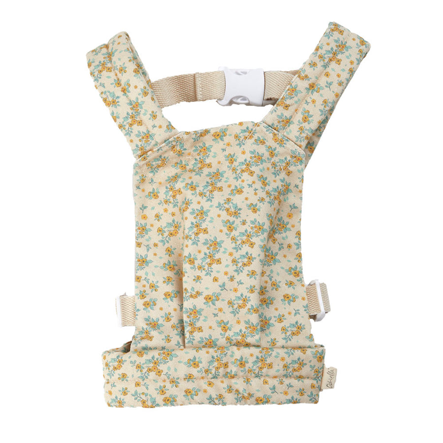 Olli Ella childrens baby doll carrier toy in the vintage floral print on a white background