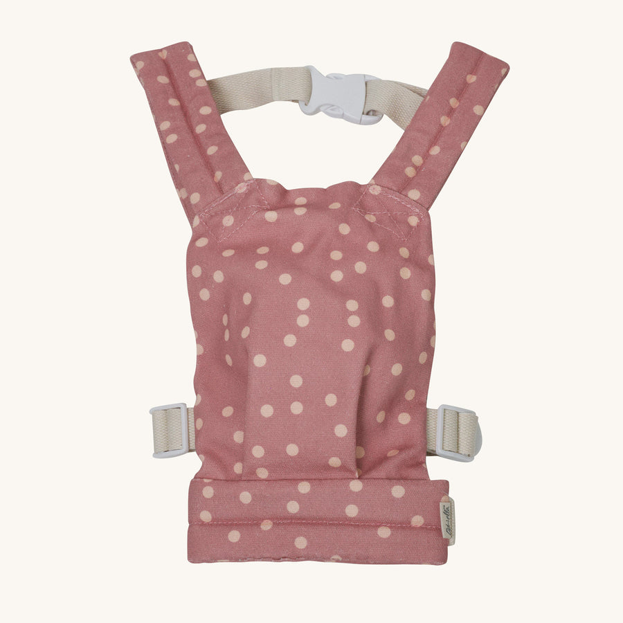 Olli Ella Pink Polka Dot Dinkum Doll Carrier pictured on a plain background