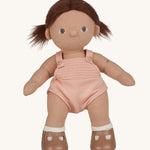 An Olli Ella Dottie Dinkum Doll on a plain background. The doll has brown hair and brown eyes. The hair is in pig tails.