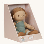 An Olli Ella Gigi Dinkum doll in a seated postion shown in it's cardboard box on a plain background. 