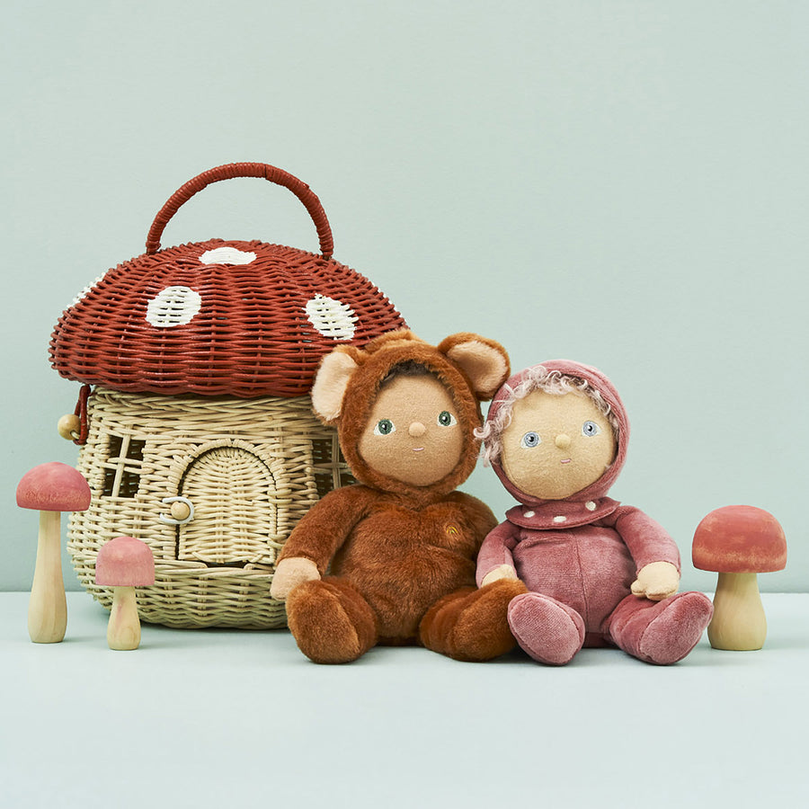 Olli Ella Dinky Dinkum Doll - Bobby Bear sits next to Tilly Toadstool in front of a wicker basket.