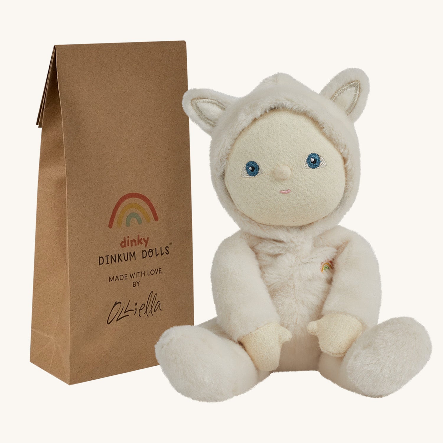 Olli Ella Dinky Dinkum Doll - Fifi Fox. The doll faces forward and sits next to its packaging.