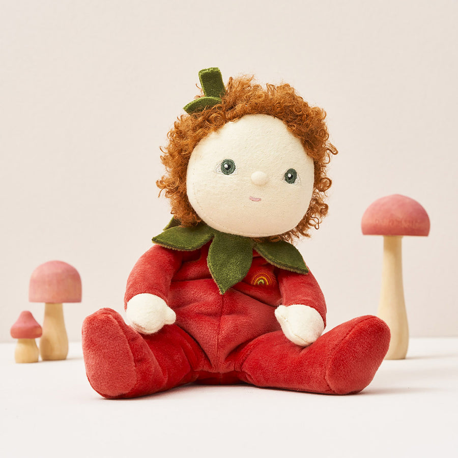 Olli Ella Dinky Dinkum Doll - Polly Poinsettia. The doll faces forward with toadstools behind it.