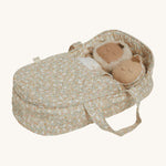 Two Dozy Dinkums laying side by side inside the Olli Ella Garden Floral Gardenia print Dinkum Dolls Quilted Carry Cot 
