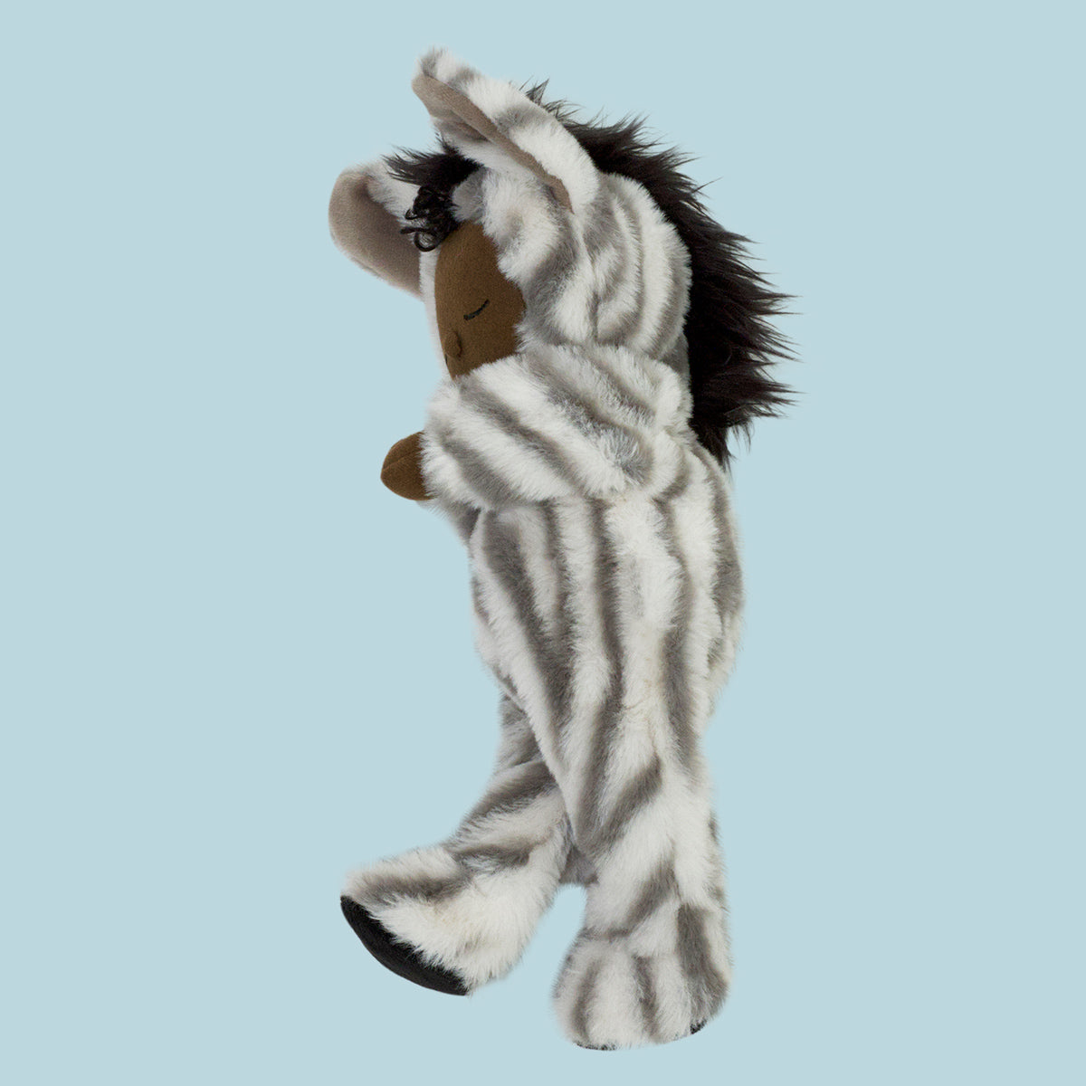 holding a Olli Ella Zebra mini Cozy Dinkum Doll