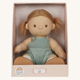 An Olli Ella Gigi Dinkum doll in a seated postion shown in it's cardboard box on a plain background. 