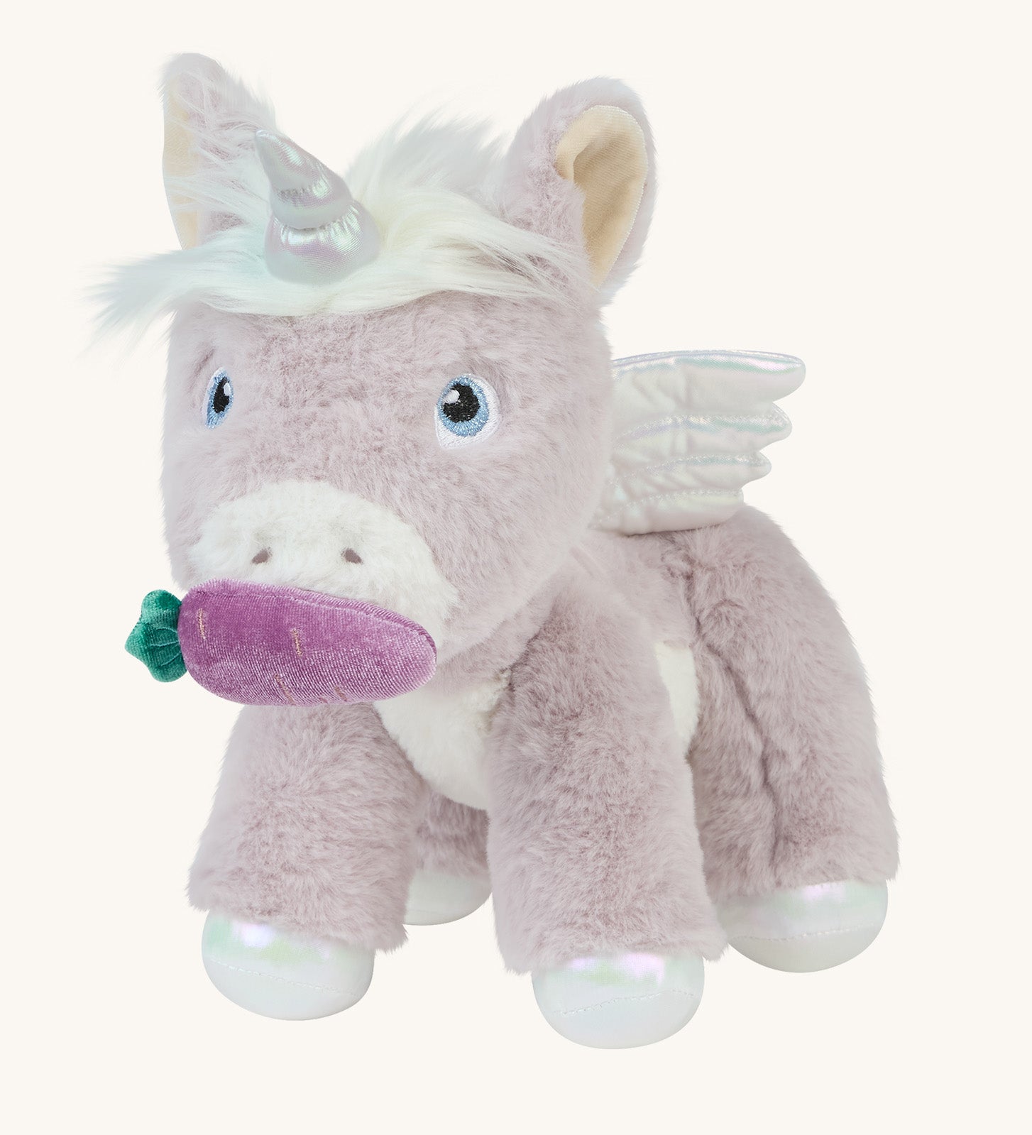 The magnetic carrot toy is attached to the unicorn's magnetic mouth, making it look as if the unicorn is eating