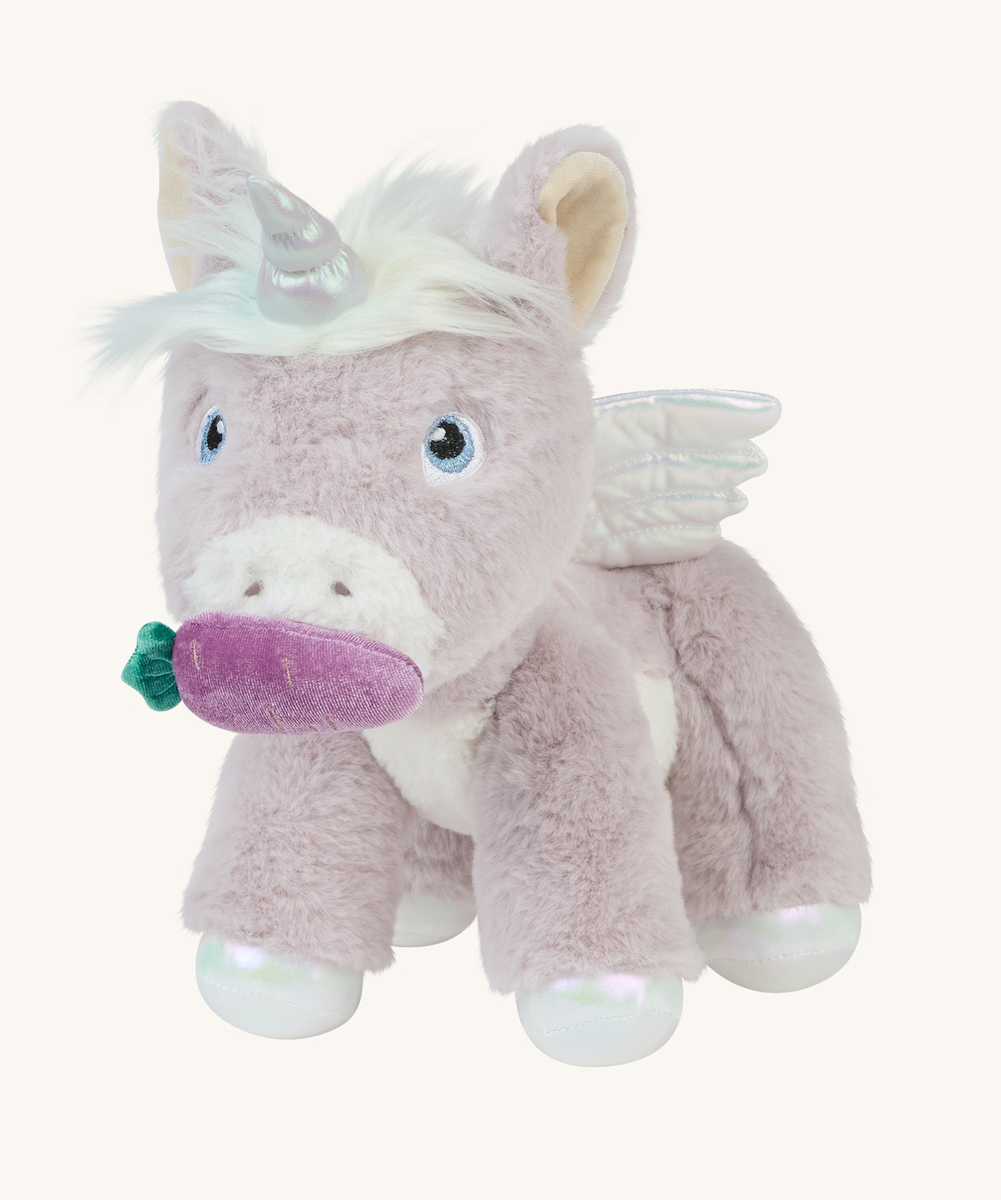 The magnetic carrot toy is attached to the unicorn's magnetic mouth, making it look as if the unicorn is eating