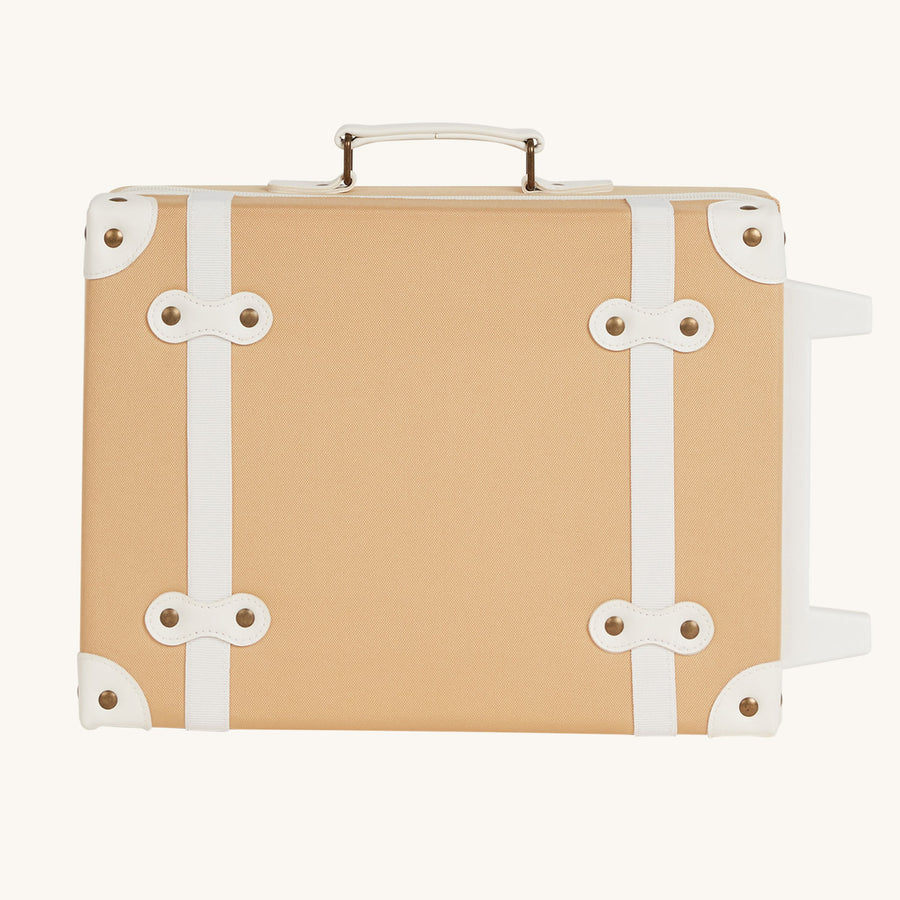 Collection of the four new Olli Ella Kids See-Ya Suitcases showing different handle heights pictured on a plain background