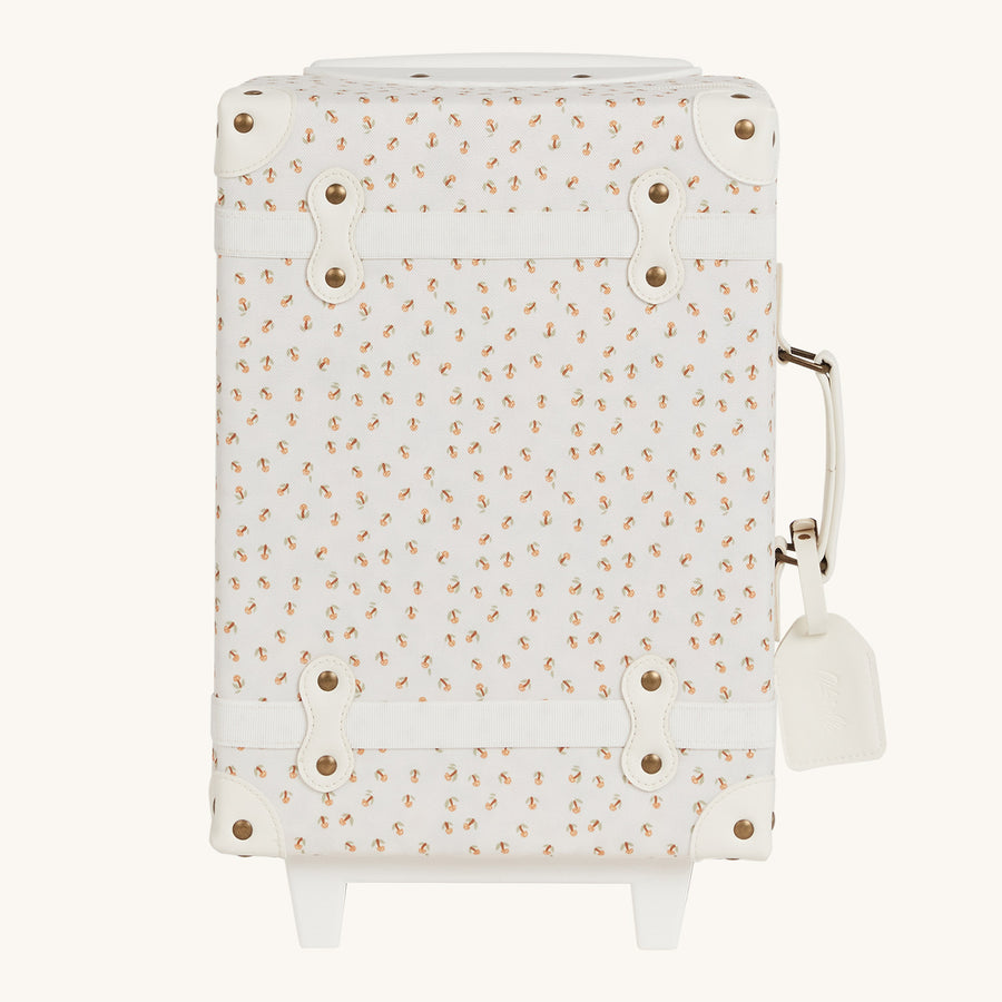 Olli Ella See-Ya Suitcase with a Leafed Mushroom print with handle down pictured on a plain background