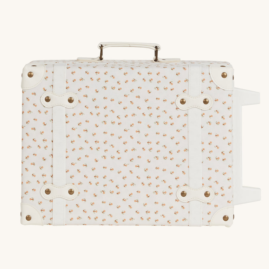 Olli Ella See-Ya Suitcase with a Leafed Mushroom print on it's side pictured on a plain background