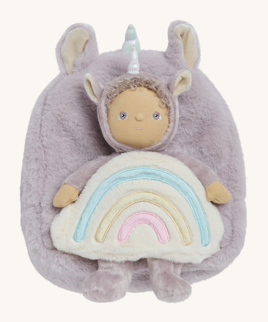 The Olli Ella lilac fluffy backpack with a dinkum dinkum doll sitting 