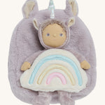 The Olli Ella lilac fluffy backpack with a dinkum dinkum doll sitting 