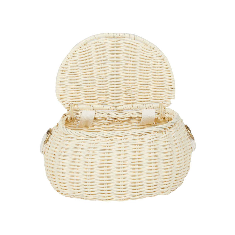 Olli ella natural rattan mini chari bag in the chalk colour with the lid open on a white background