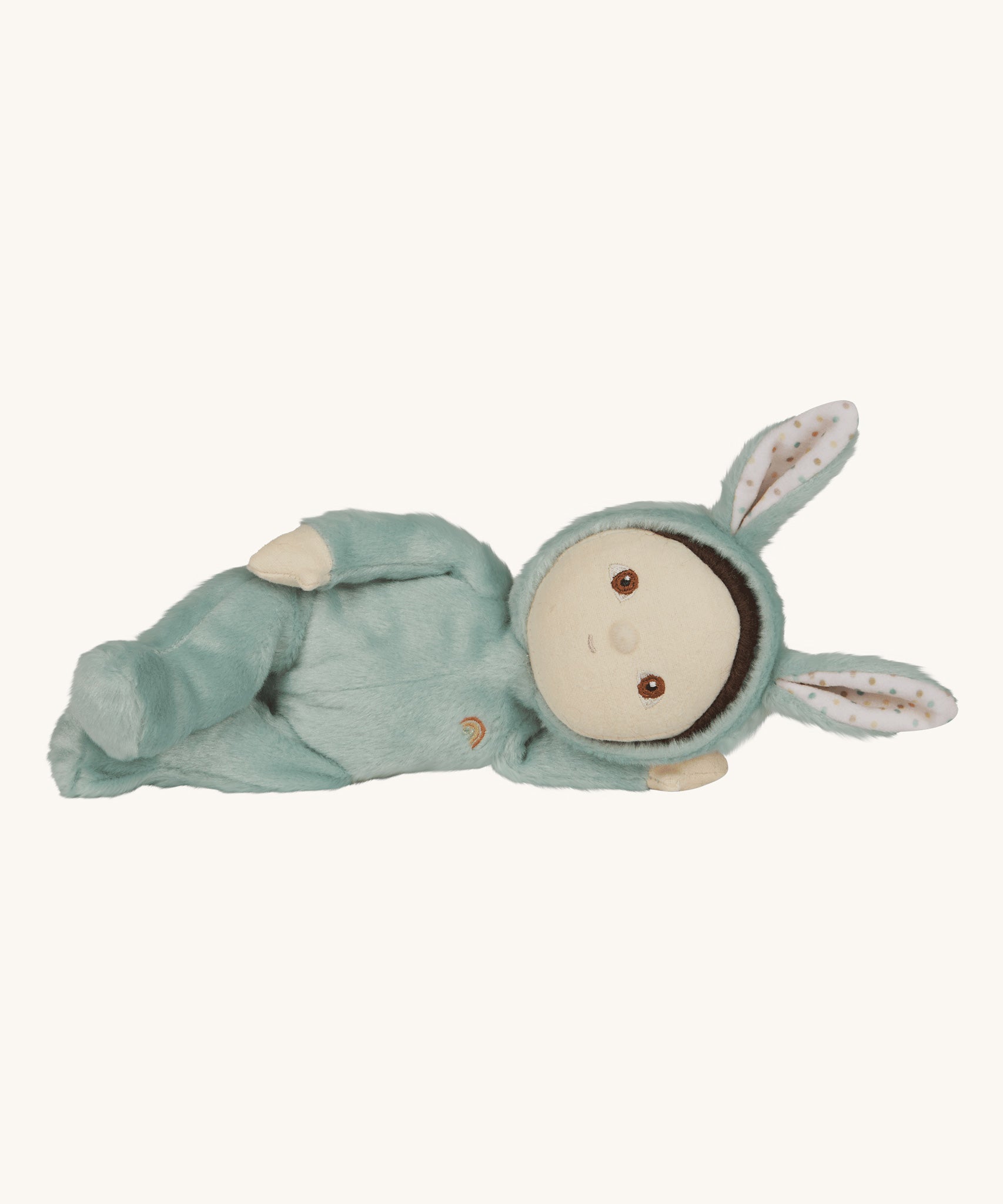 Olli Ella mint green coloured Biscuit Bunny Dinky Dinkum Doll in a side laying position