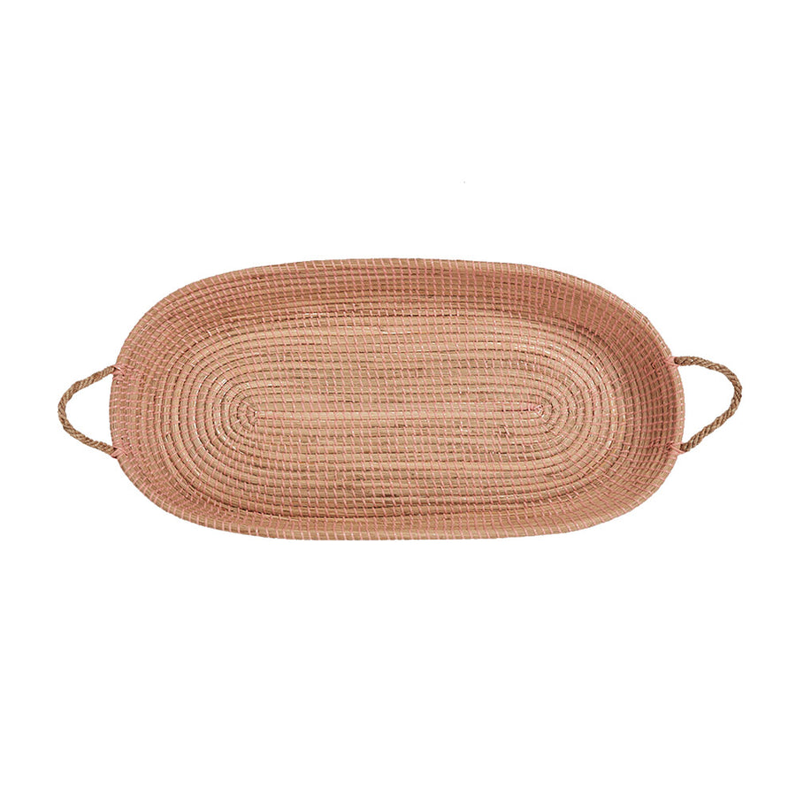 Olli Ella eco-friendly natural seagrass baby changing basket in rose pink on a white background