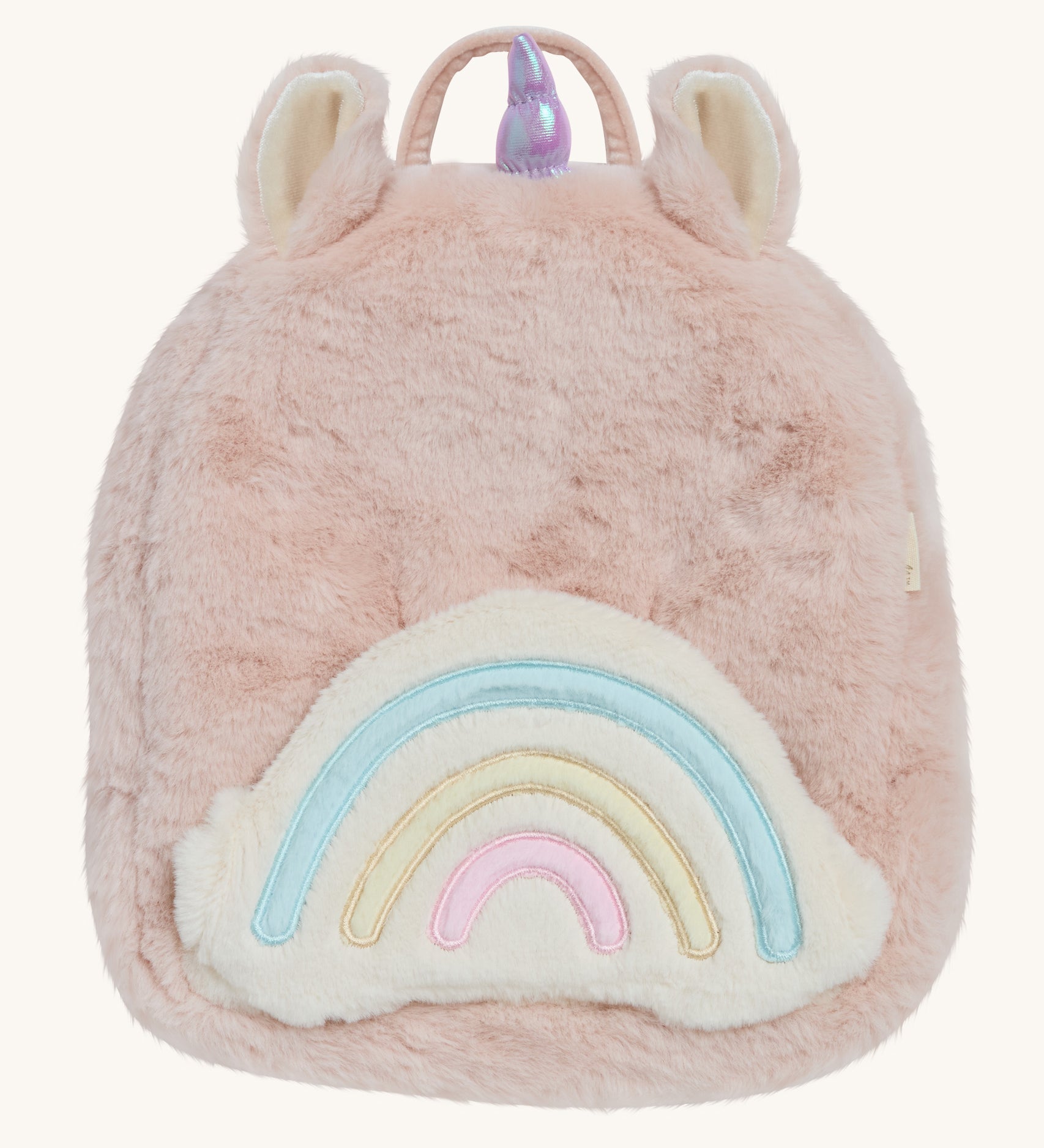 A OIli Ella pink fluffy unicorn backpack with a rainbow on the front on a cream background.