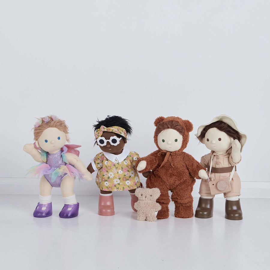 group of dinkum dolls dressed in pretend play packs from olli ella