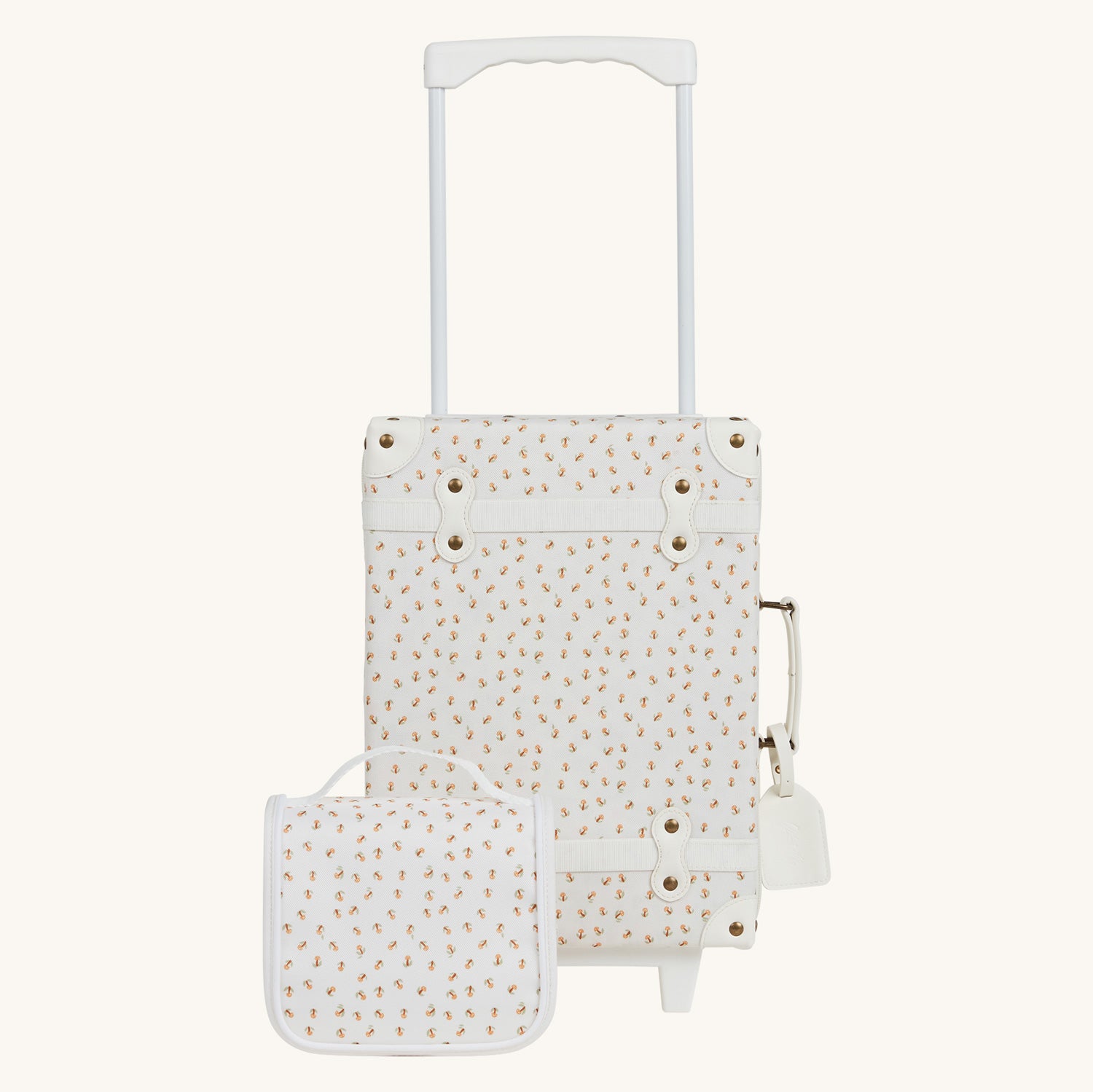 Olli Ella See-Ya Wash Bag with a Leafed Mushroom print next to the matching suitcase pictured on a plain background