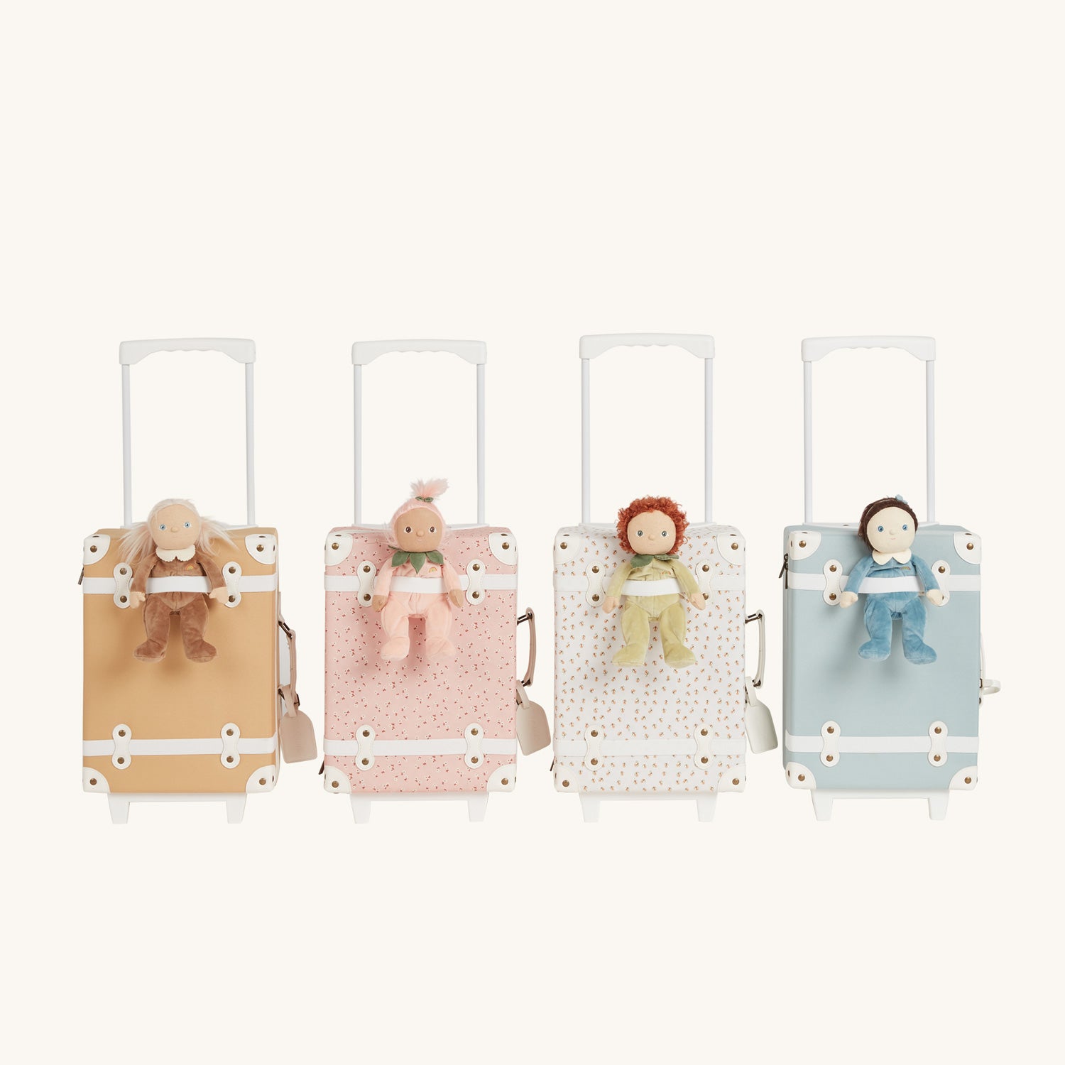 Collection of four Olli Ella See-ya suitcases with handles extended and a Dinky Dinkum on each pictured on a plain background